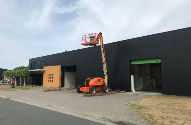 Overspuiten gedelamineerde gevel Hengelo